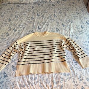 Cream sweater with navy blue stripes